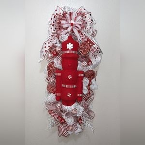 Red flocked Peppermint Nutcracker Swag